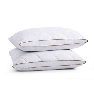 The white goose feather gusset pillows are covered in soft white hues. Welcome the perfect cradle of cloud-like comfort to your bedtime routine and improve your sleep quality with these feather goosedown pillows.