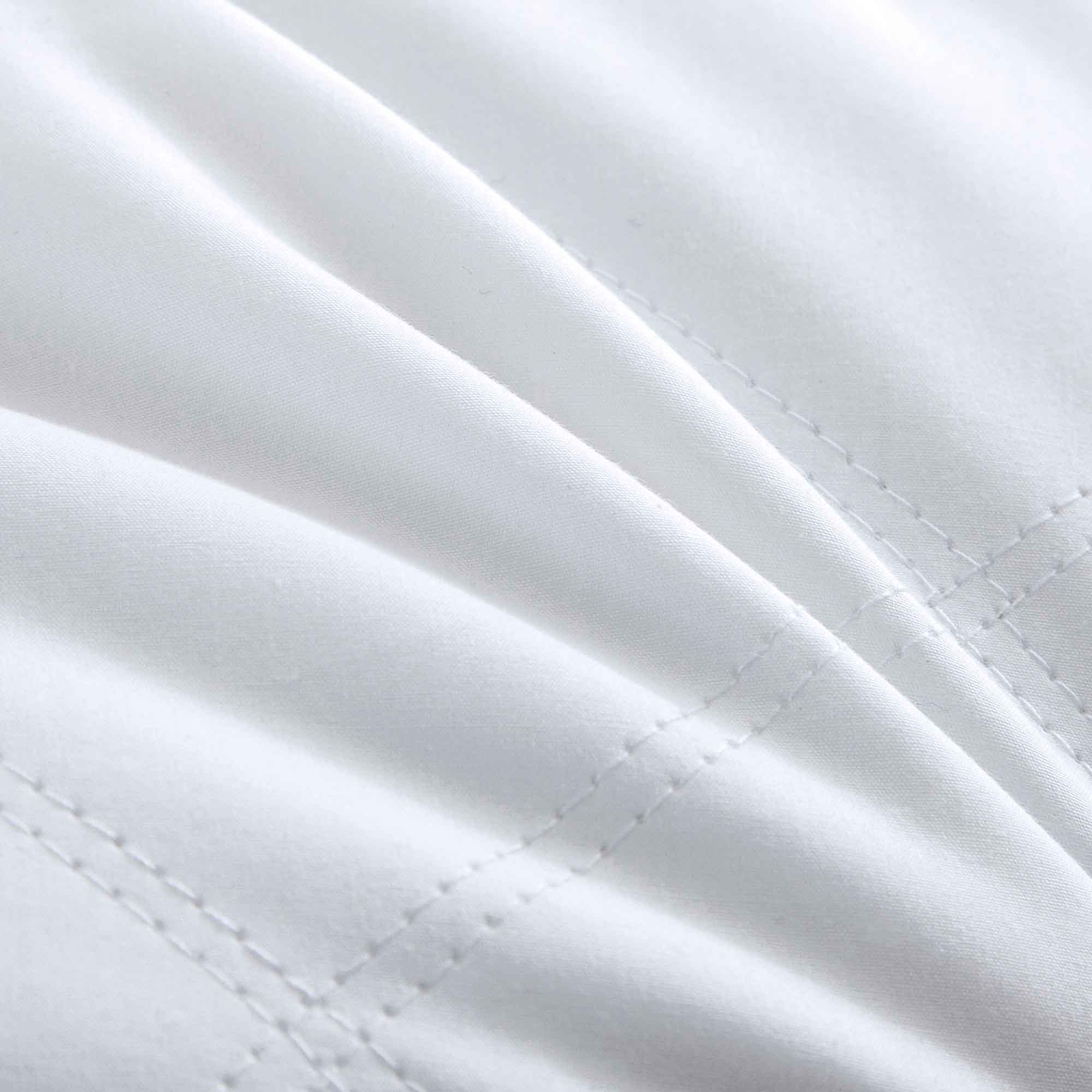 2-pack gusseted goose down feather pillows with sidewall design for added loft and support, featuring natural fill and 100% cotton cover.