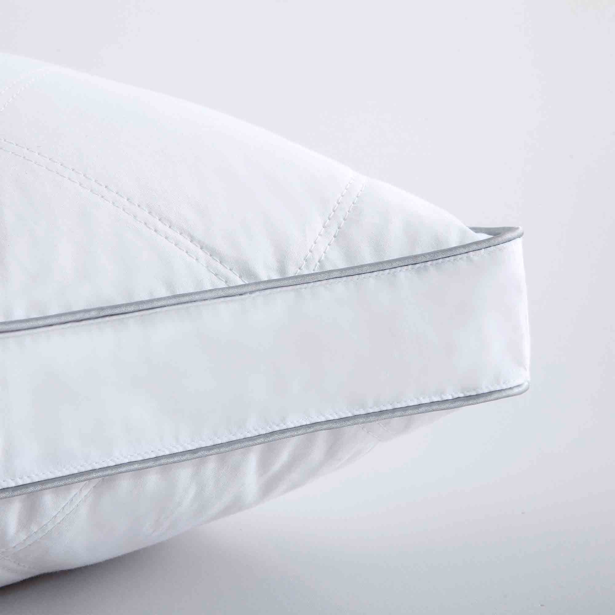 2-pack gusseted goose down feather pillows with sidewall design for added loft and support, featuring natural fill and 100% cotton cover.