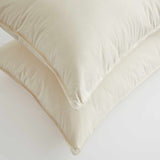 This medium-firm pillow offers classic flat support, catering to individuals who favor a more understated pillow height. It is particularly well-suited for back and stomach sleepers, offering a gentle and snug sleep experience.