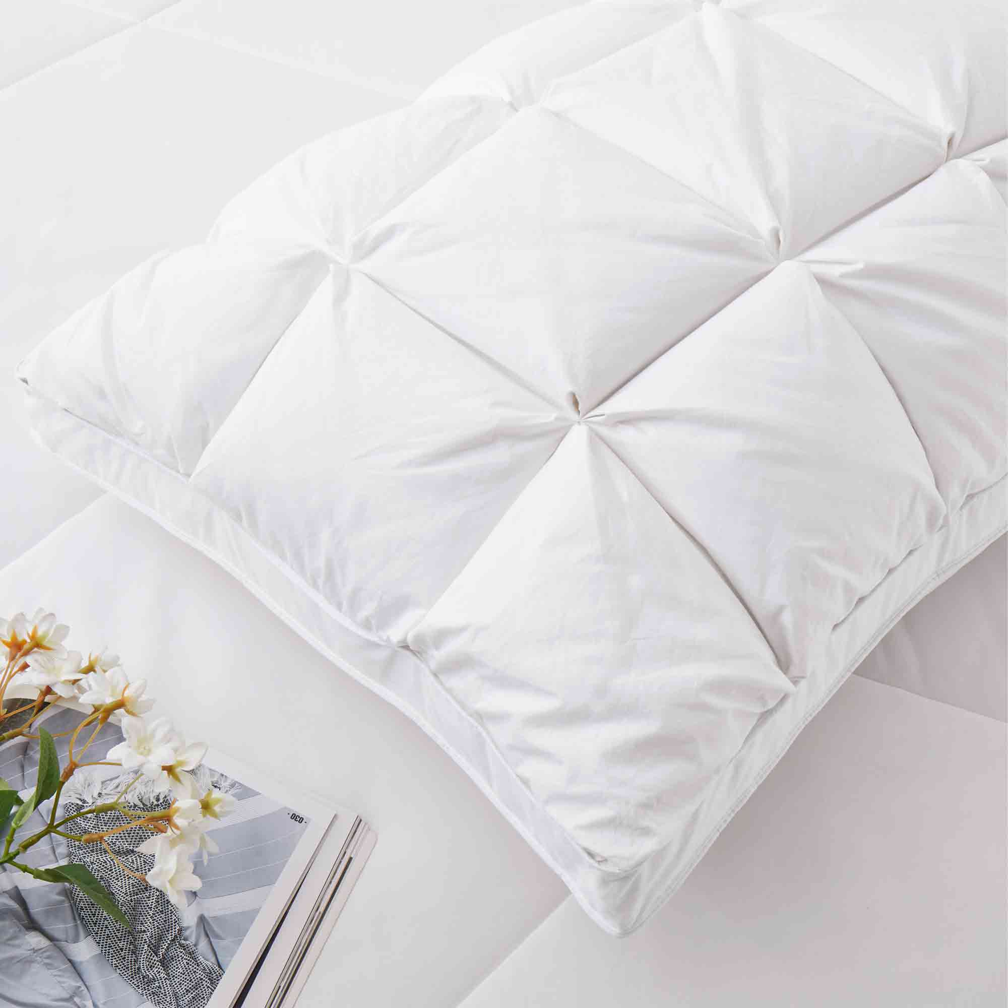The perfect pillow is brushed in the serene tones of white. Add a dash of summer delight to your room with these luxury down goose feather pillows in white.
