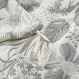 A mesmerizing floral pattern in tones of light grey covers the duvet cover set. Enrich your level of health with this organic gauze cotton duvet set in Light Grey.