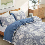 The cotton and gauze duvet cover set is adorned with a symphony of flowers in a lovely pattern and brushed in the sophisticated tones of navy. Enjoy ultimate comfort and comfortable sleep every night with this duvet set in Navy.