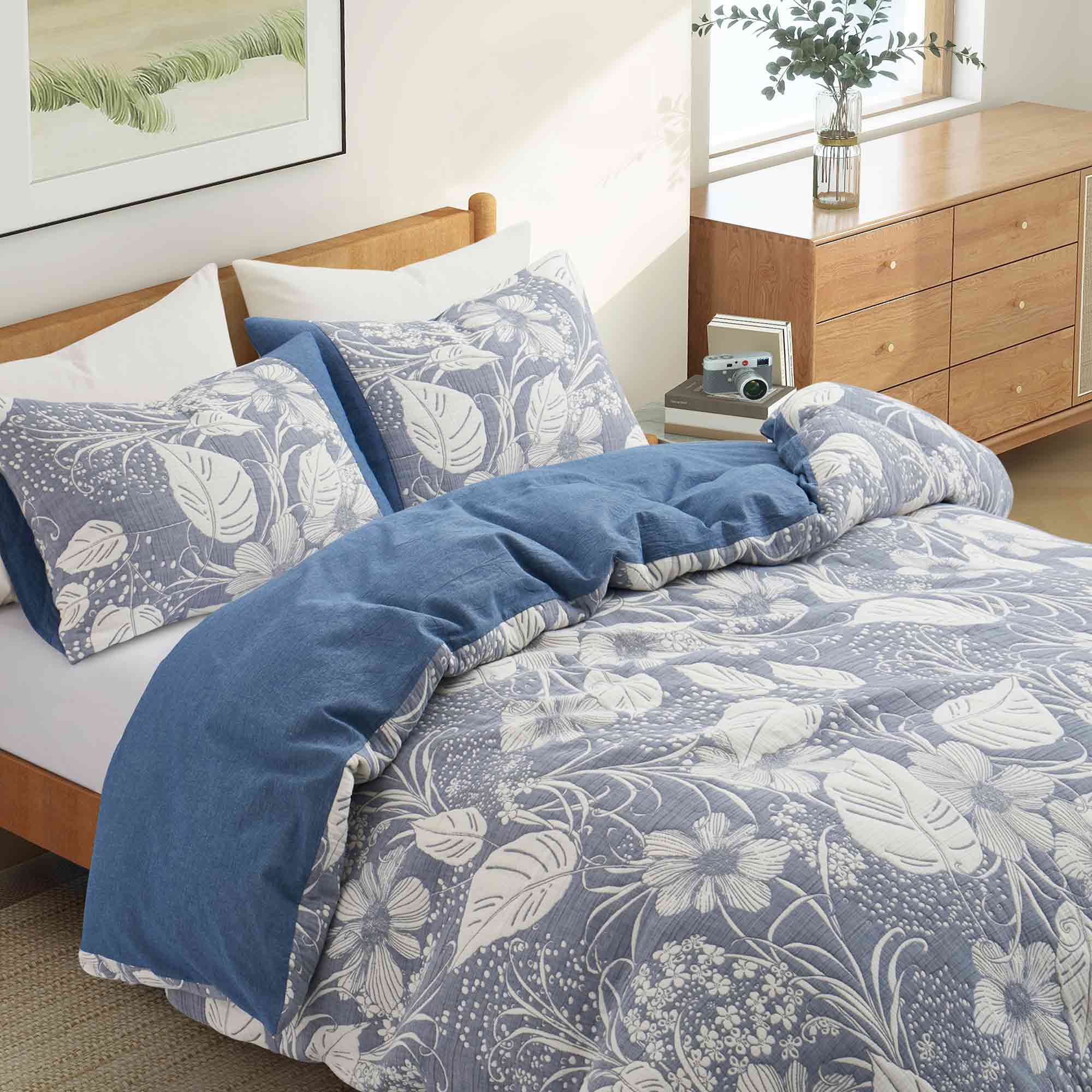 The cotton and gauze duvet cover set is adorned with a symphony of flowers in a lovely pattern and brushed in the sophisticated tones of navy. Enjoy ultimate comfort and comfortable sleep every night with this duvet set in Navy.