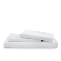 Folded white bed sheets stacked neatly on a white background—ideal for pairing with the Organic Bamboo Duvet Cover Set for a comfortable, breathable bedding ensemble.