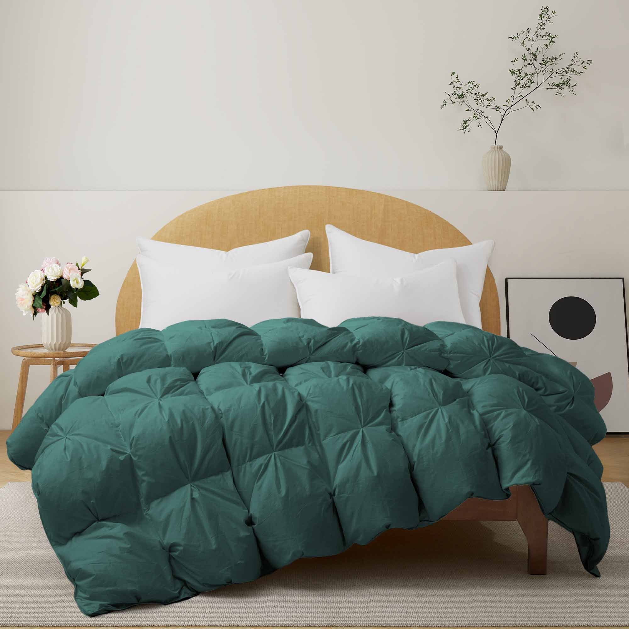 The down feather comforter is brushed in medium tones of forest green. Add a natural element to your bedroom style with this green color medium weight comforter.