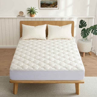 The waterproof protector is covered in the shades of natural material organic cotton or off-white tones. Enjoy extra comfort with this additional layer of comfort white mattress cover on your up to 15 inch deep mattress.