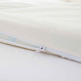 The organic cotton mattress encasement is covered in the serene tones of off-white. Turn your bedroom into a comfortable sleep environment with this washing machine friendly wash cover in off white.