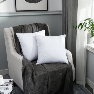 These designer pillow inserts are brushed in somber hues of silver. Add a touch of sophistication and style to your bed space with this premium pillow option.