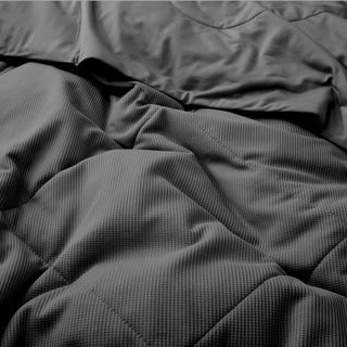 What is the best down alternative comforter when it comes to a blissful sleep experience? Our dark grey comforter in a darker tone is one of the best to achieve unparalleled comfort.