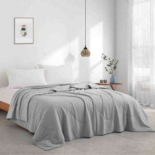 The down alternative comforter is enveloped in the soft tones of light gray. Wrap yourself in a cloud of tranquility and bring a contemporary style to your bedding decor with the light gray comforter.