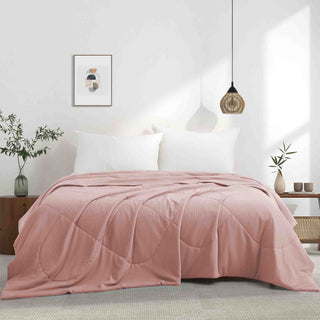 The down alternative comforter is brushed in the exquisite tones of pink. Feel the gentle embrace of sweetness and whimsy with the pink comforter for an exquisite touch to your space.