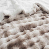 Soft Taupe offers cozy elegance for the cold season. This 3-piece reversible faux rabbit fur comforter set features an ultra-soft, velvety texture paired with a plush sherpa reverse, providing exceptional warmth and comfort during chilly nights. The soothing blend of beige and gray tones adds a touch of sophistication to any bedroom, making it the perfect choice for a stylish, snug winter retreat.