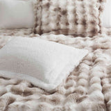 Soft Taupe offers cozy elegance for the cold season. This 3-piece reversible faux rabbit fur comforter set features an ultra-soft, velvety texture paired with a plush sherpa reverse, providing exceptional warmth and comfort during chilly nights. The soothing blend of beige and gray tones adds a touch of sophistication to any bedroom, making it the perfect choice for a stylish, snug winter retreat.
