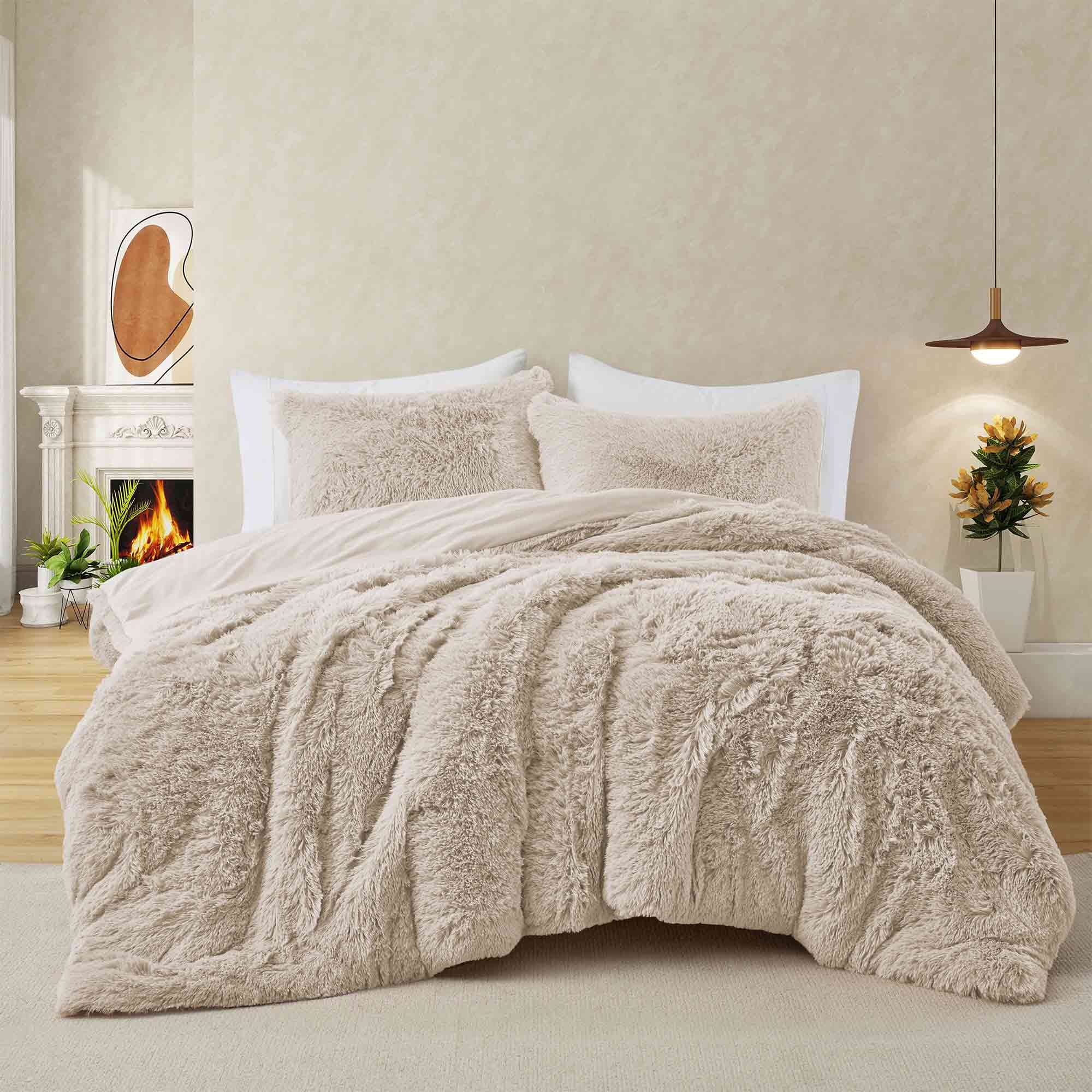 Stay cozy through the cold months with the 3-Piece Plush Reversible Faux Fur Comforter Set in Beige. The warm neutral tone pairs easily with any décor, while plush faux fur and smooth microfiber bring soft comfort and elegant style.