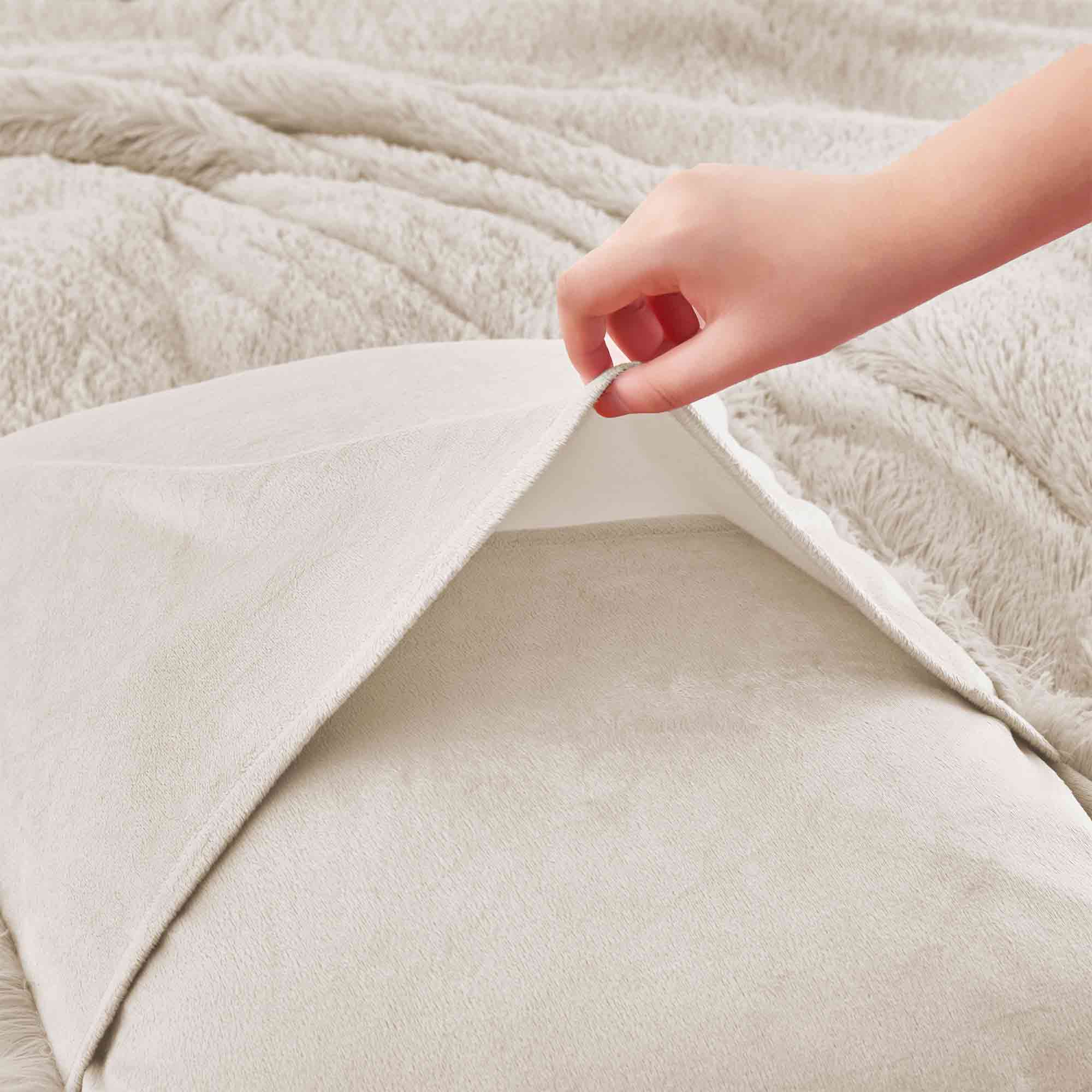 Stay cozy through the cold months with the 3-Piece Plush Reversible Faux Fur Comforter Set in Beige. The warm neutral tone pairs easily with any décor, while plush faux fur and smooth microfiber bring soft comfort and elegant style.