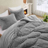 Add modern warmth to your bedroom with the 3-Piece Plush Reversible Faux Fur Comforter Set in Gray. Perfect for chilly seasons, the soft faux fur side offers cozy texture, while the sleek microfiber reverse adds versatility and style.