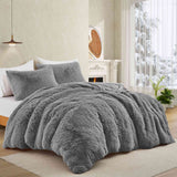 Add modern warmth to your bedroom with the 3-Piece Plush Reversible Faux Fur Comforter Set in Gray. Perfect for chilly seasons, the soft faux fur side offers cozy texture, while the sleek microfiber reverse adds versatility and style.