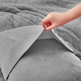 Add modern warmth to your bedroom with the 3-Piece Plush Reversible Faux Fur Comforter Set in Gray. Perfect for chilly seasons, the soft faux fur side offers cozy texture, while the sleek microfiber reverse adds versatility and style.