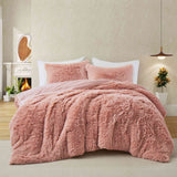 Bring a touch of romance to cold nights with the 3-Piece Plush Reversible Faux Fur Comforter Set in Pale Blush. The gentle pink shade enhances your décor, while plush faux fur and smooth microfiber keep you warm and comfortable