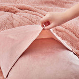 Bring a touch of romance to cold nights with the 3-Piece Plush Reversible Faux Fur Comforter Set in Pale Blush. The gentle pink shade enhances your décor, while plush faux fur and smooth microfiber keep you warm and comfortable.
