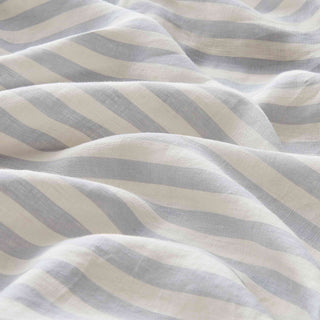 The bedroom linen is enveloped in contrasting gray and white stripes. Create a cozy and sophisticated atmosphere in your bedroom with our duvet cover set in classic gray stripes.