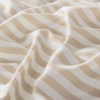This natural color linen bedding is enveloped in soft and delicate interplay of beige and white stripes. Impart a warm glow to your bedroom with this bedding linen duvet cover set.