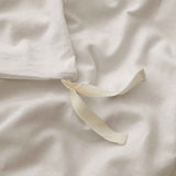 Classic and versatile, the Beige Linen Cotton Blend Duvet Cover Set brings an airy, textured elegance to any bedroom. Made from a 55/45 linen-cotton blend, it offers the crisp feel of linen with the softness of cotton, ensuring moisture-wicking breathability and lasting durability