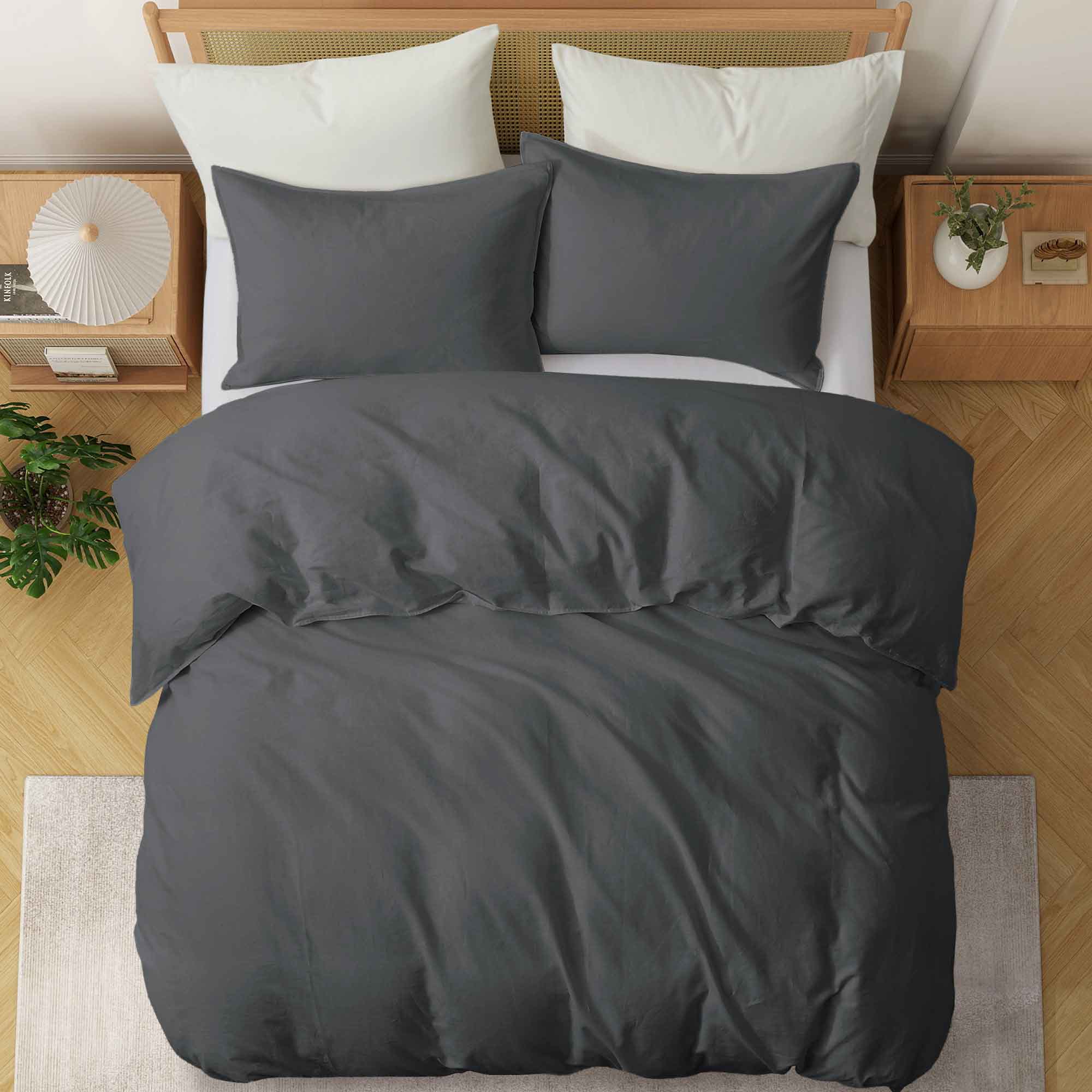 Deep charcoal gray duvet cover and pillowcases made from soft linen-cotton blend.