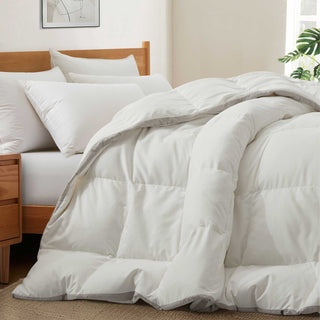 The all-natural blend comforter is brushed in the serene hues of white. Bring the all-season mirth to your bedroom with this feather goose down fiber comforter.