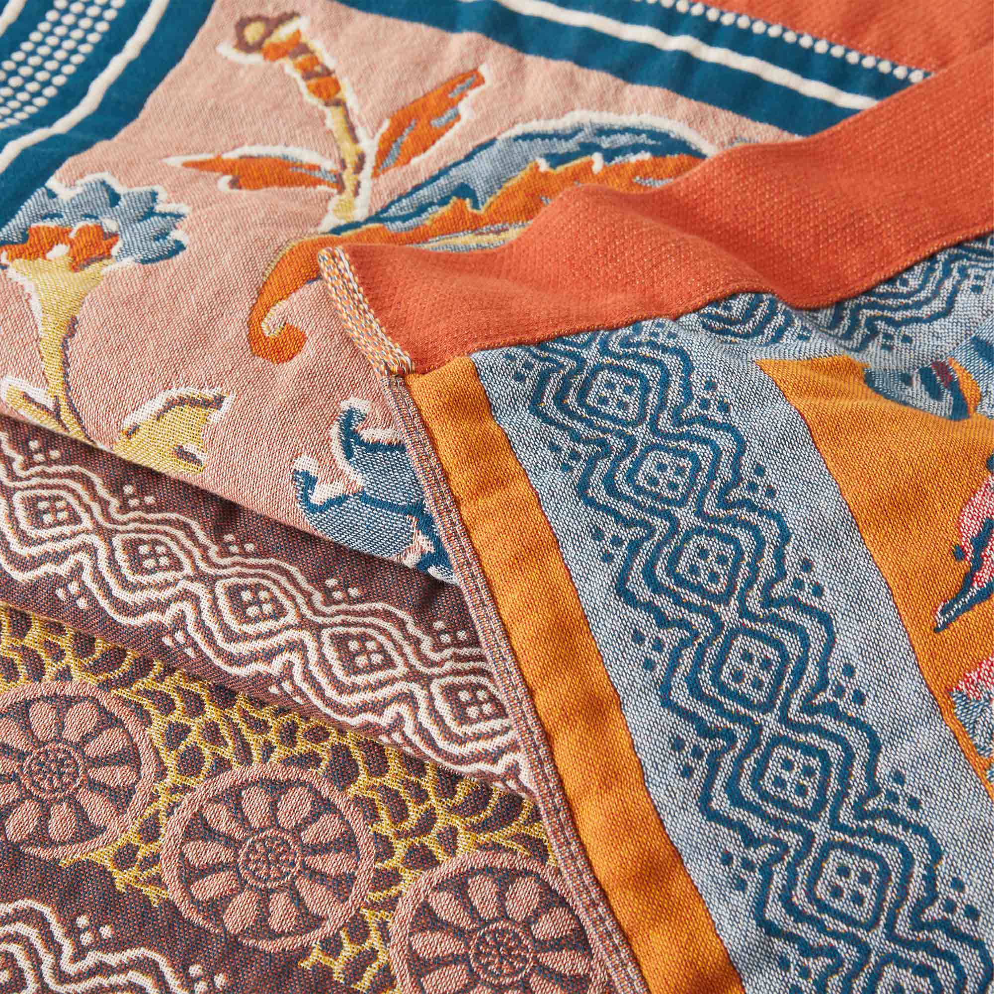 The gorgeous piece incorporates exquisite patchwork designs featuring flowers, paisleys, and scenes from nature. This plush blanket brings the beauty of old times to your bedroom.