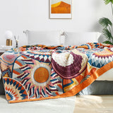 The couch blanket features abstract patterns of sunrise in vivid hues. Welcome the bright and shiny summers with this sweet blanket in Sunrise style.