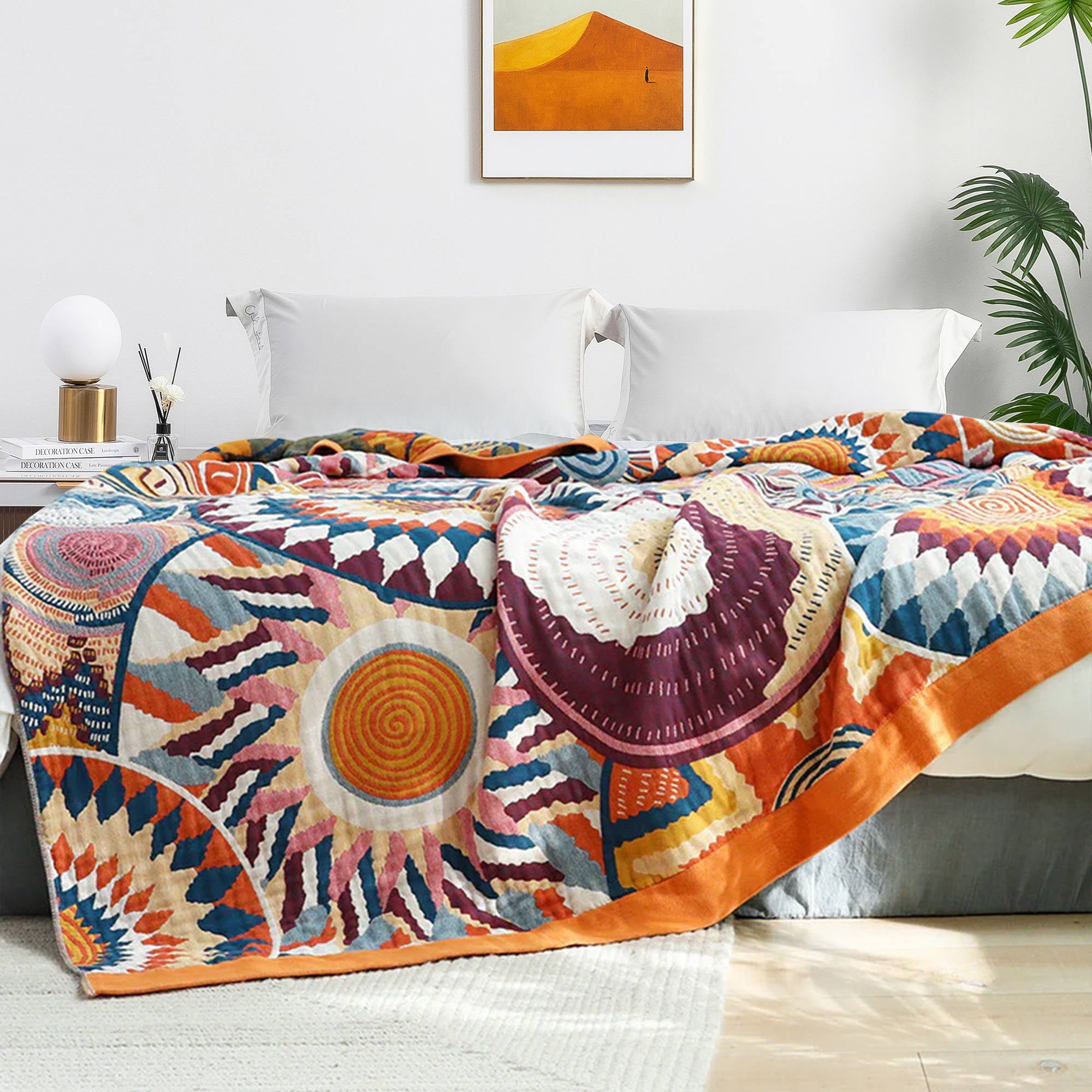 The couch blanket features abstract patterns of sunrise in vivid hues. Welcome the bright and shiny summers with this sweet blanket in Sunrise style.