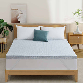 The gel and foam mattress topper is covered in crisp white tones. Revel in a sleep oasis like no other with this gel foam mattress pad in white.