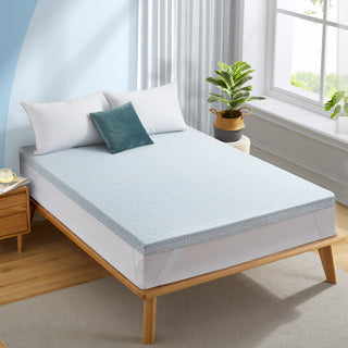 The gel and foam mattress topper is covered in crisp white tones. Revel in a sleep oasis like no other with this gel foam mattress pad in white.