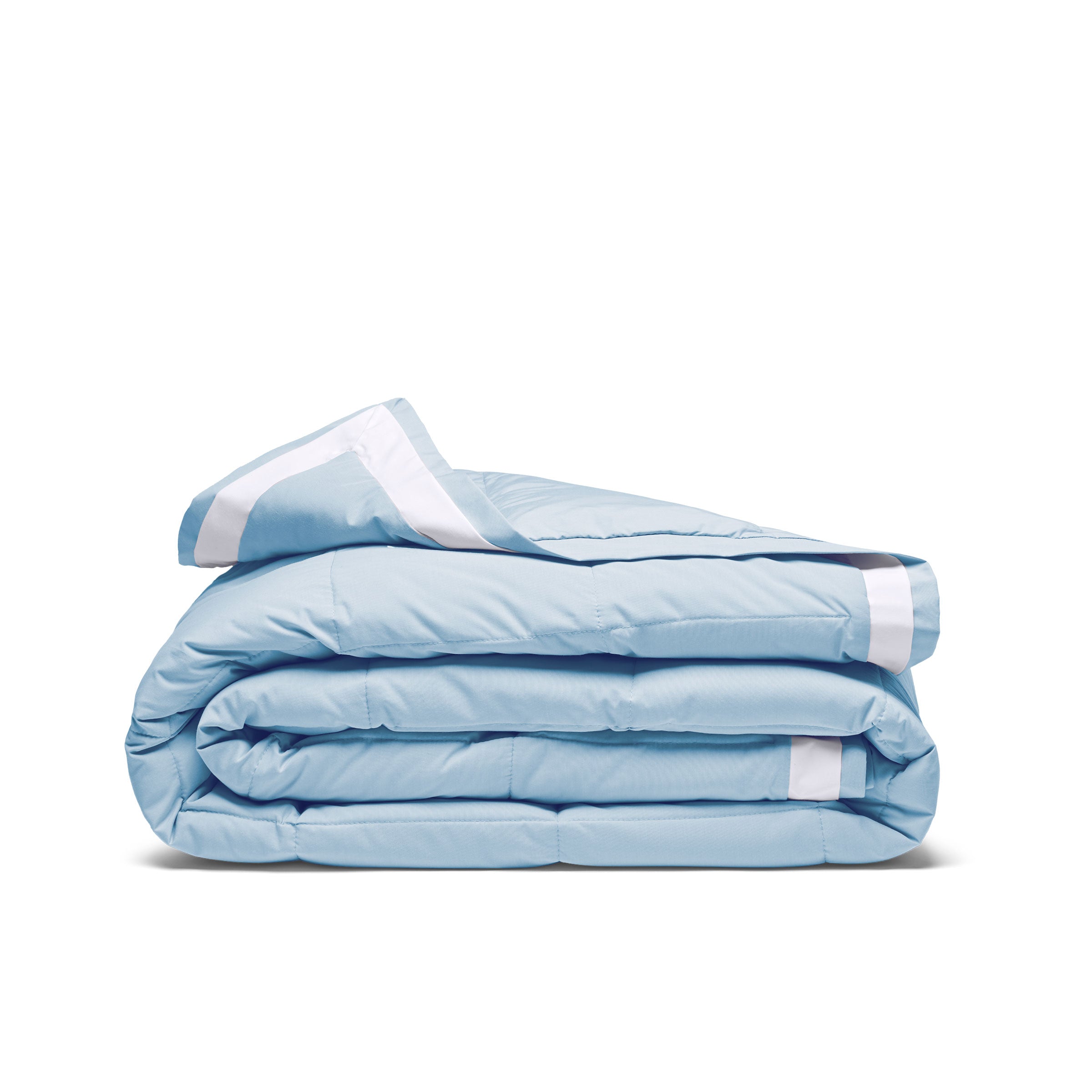 The feather down comforter blanket is enveloped in the airy tones of sky blue with a contrasting white trim. Enhance your bedding with the beauty of the skies with this summer season comforter in sky blue.
