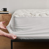 The waterproof protector is covered in the shades of natural material organic cotton or off-white tones. Enjoy extra comfort with this additional layer of comfort white mattress cover on your up to 15 inch deep mattress.