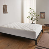 The waterproof protector is covered in the shades of natural material organic cotton or off-white tones. Enjoy extra comfort with this additional layer of comfort white mattress cover on your up to 15 inch deep mattress.