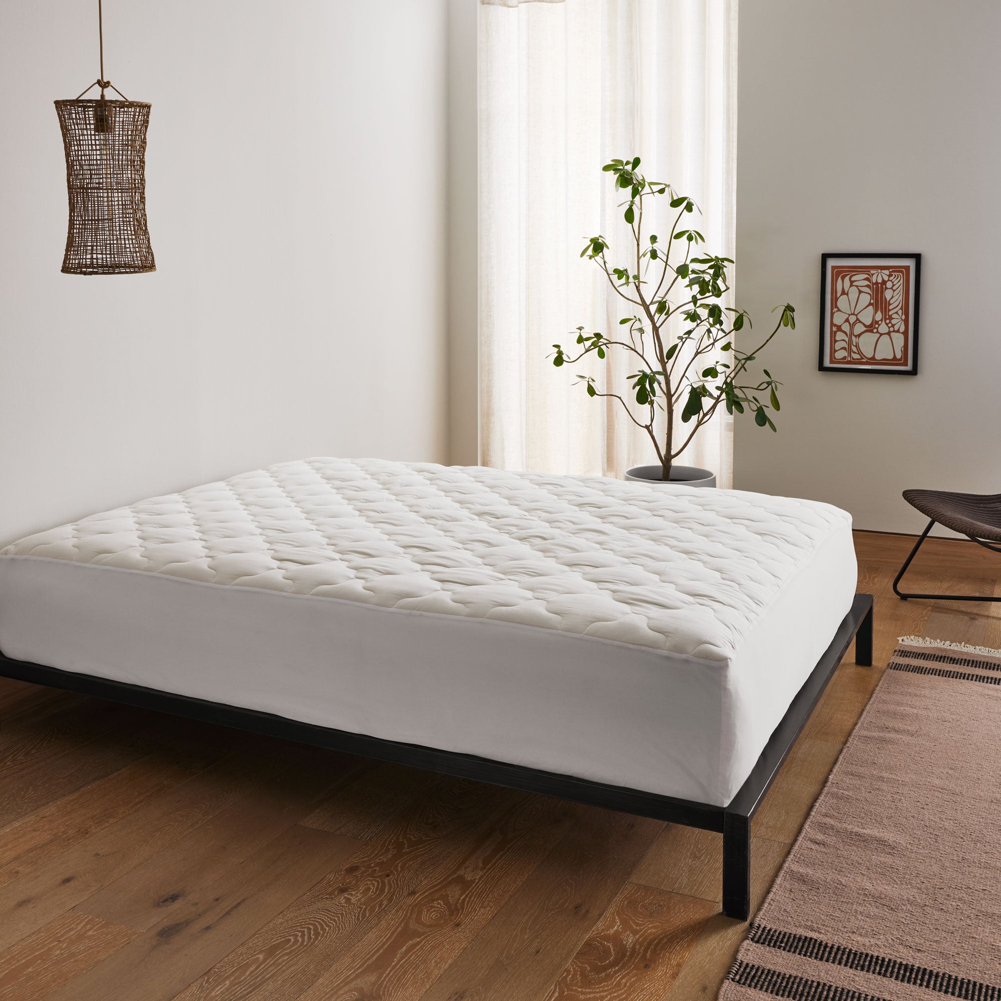 The waterproof protector is covered in the shades of natural material organic cotton or off-white tones. Enjoy extra comfort with this additional layer of comfort white mattress cover on your up to 15 inch deep mattress.