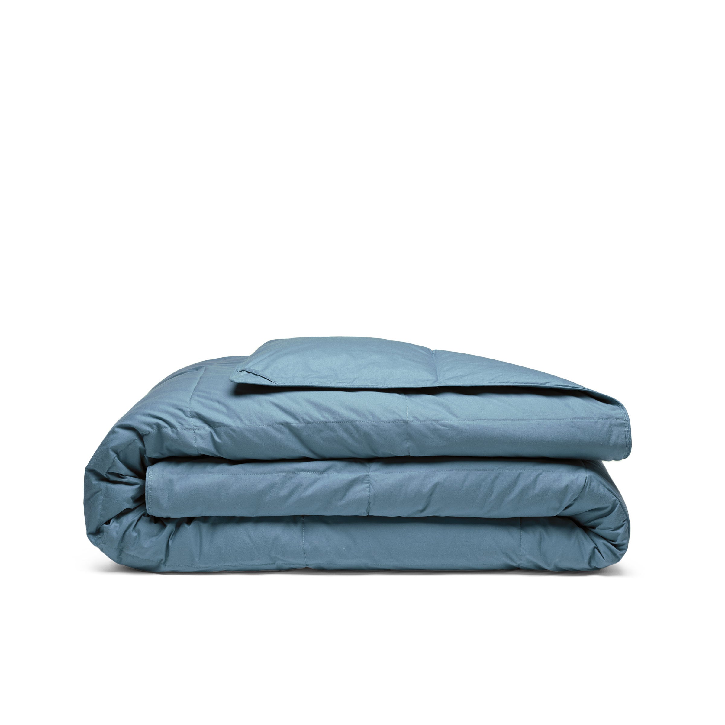 Elevate your sleep setup with our Castle Blue Organic Cotton Comforter, featuring a deep, rich blue hue that brings bold elegance to any bedroom. Made with GOTS-certified organic cotton and filled with down and feather fiber, this luxurious comforter offers breathable warmth and long-lasting comfort. Ideal for modern or dramatic interiors, the Castle Blue version is a statement piece that combines sustainable materials with sophisticated design