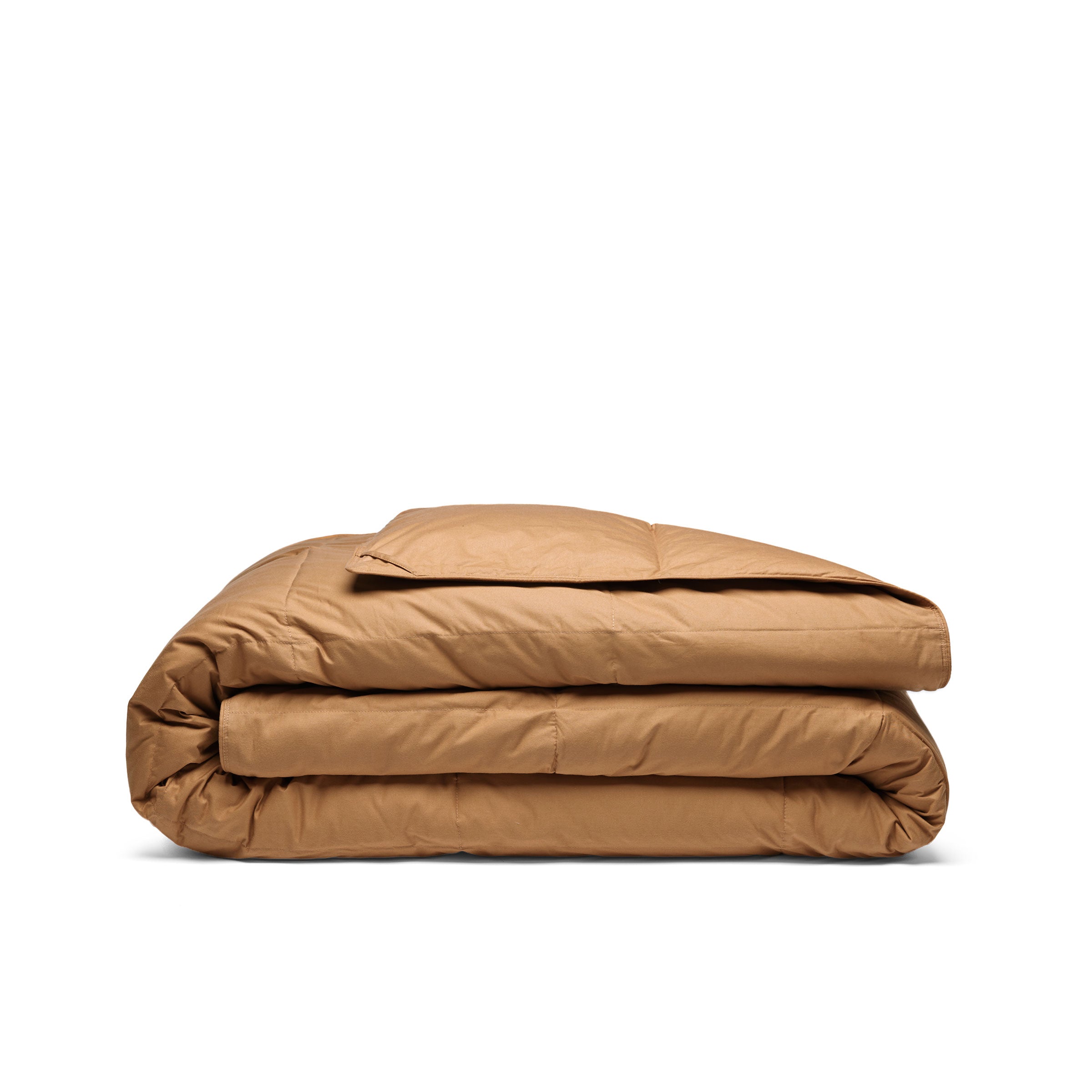 Wrap yourself in the earthy warmth of our Fawn Organic Cotton Down Comforter. This neutral beige comforter is designed with a natural GOTS-certified organic cotton shell and filled with plush, responsibly sourced down and feather fiber for breathable comfort year-round. The fawn tone adds a cozy, grounding presence to any bedroom, making it an ideal choice for those who love warm neutrals and organic, sustainable bedding that soothes both body and mind.