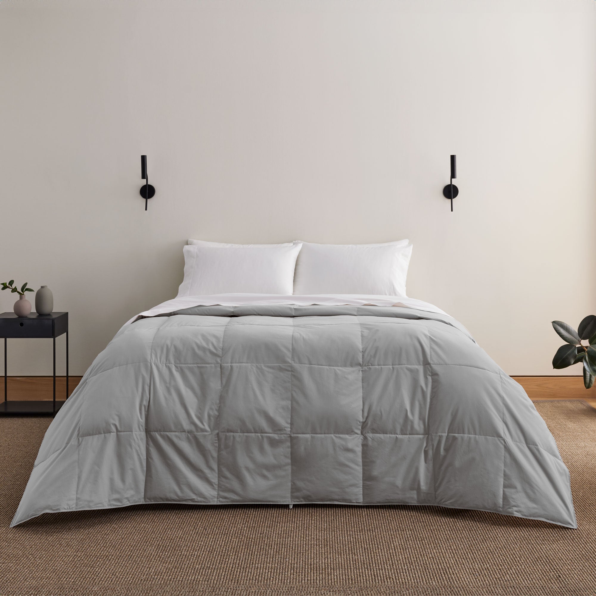 Indulge in the luxurious softness and durability of our organic comforter option in a versatile and chic gray shade, offering a cozy and sustainable way to enrich your sleep experience and enhance your bed in luxury style.