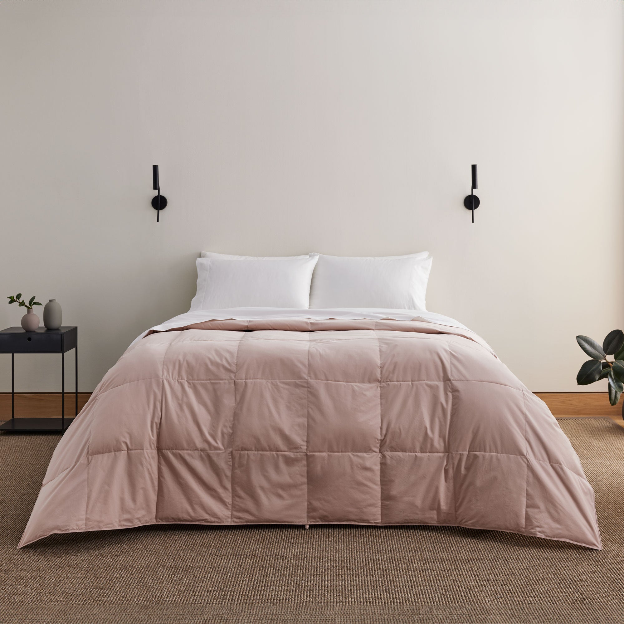 Soft, romantic, and endlessly cozy, our Smoke Rose Organic Cotton Down Comforter is a dream come true for anyone who loves gentle hues and feminine touches. The dusty pink shade adds subtle charm to your space, while the lightweight organic cotton shell and natural down and feather fiber fill offer breathable, all-season warmth. Perfect for layering or using on its own, this pink organic comforter is as stylish as it is sustainable.