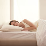 This medium-firm pillow offers classic flat support, catering to individuals who favor a more understated pillow height. It is particularly well-suited for back and stomach sleepers, offering a gentle and snug sleep experience.