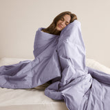 The Lavender organic cotton comforter brings a soft, calming touch to your bedding. Its breathable and lightweight design makes it perfect for warm climates or layering, while the soothing hue adds a subtle pop of color to any room.