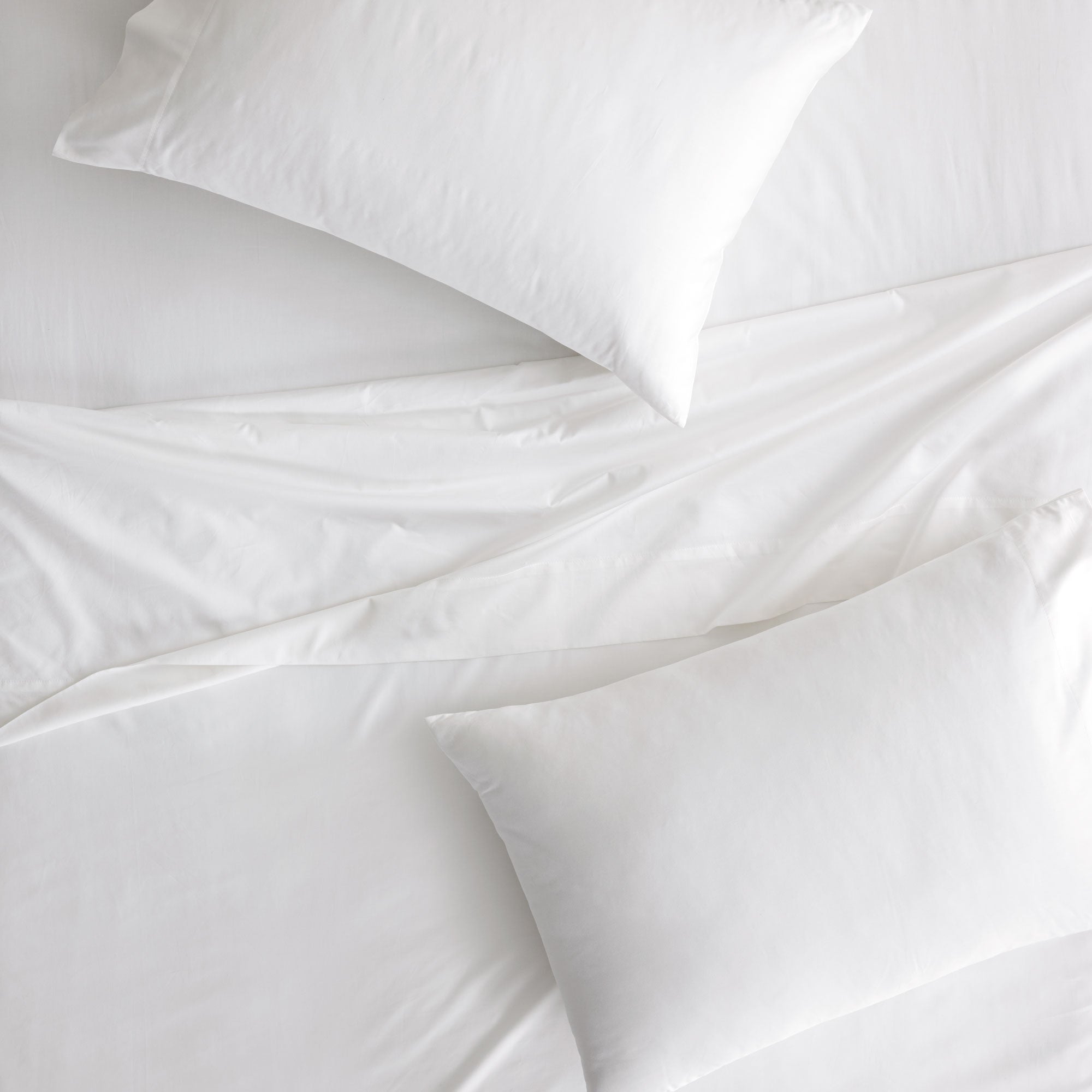 Crafted from 100% GOTS-certified organic cotton, this soft and breathable sheet set offers a clean, chemical-free sleep experience with a smooth 400-thread count and deep 16" pockets for a secure fit.