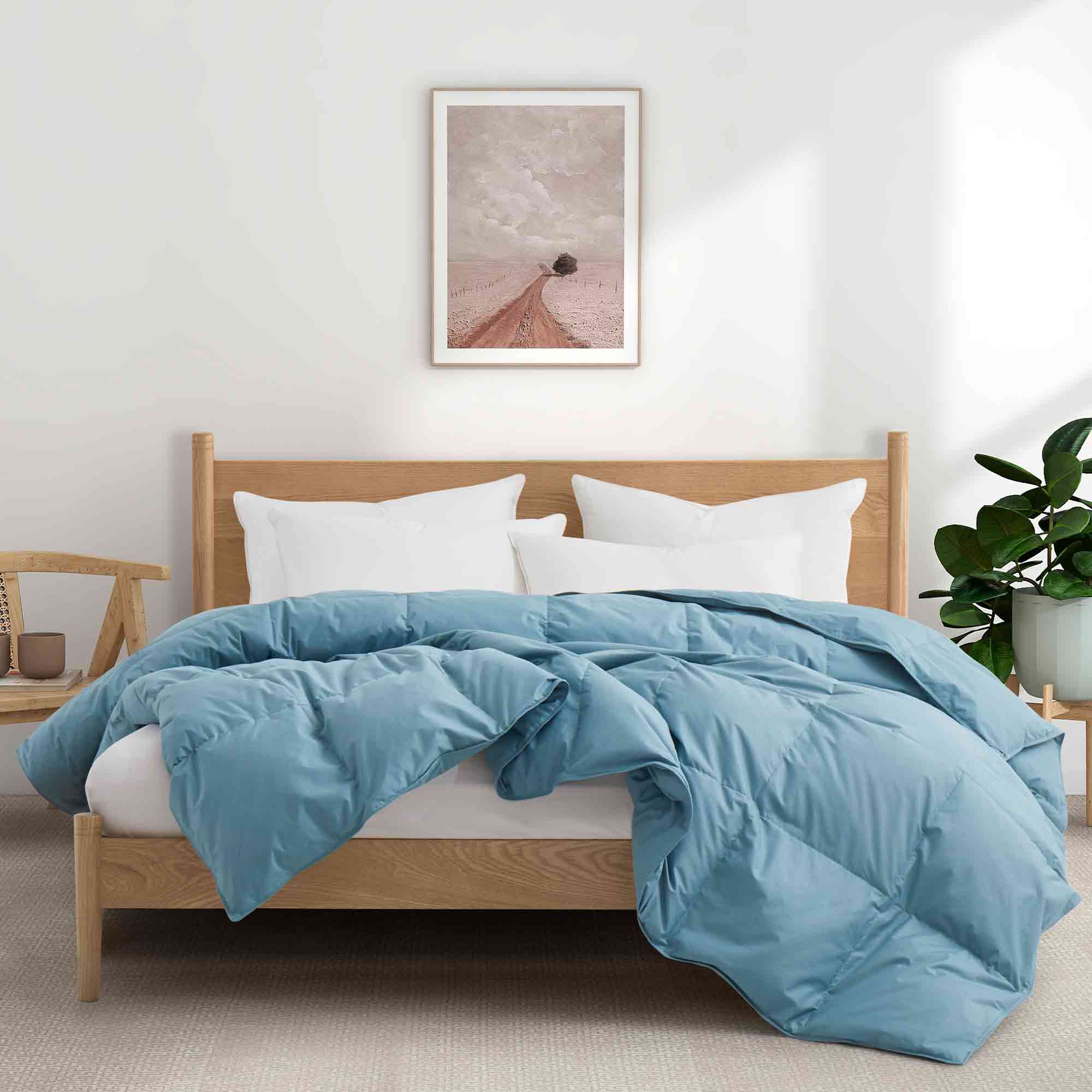 Embrace a luxurious, comfortable sleep every night with the Puredown All Season Organic Cotton Down Feather Fiber Comforter. The duvet insert can be attached to your duvet cover with ease, thanks to the four corner loops. Double-needle stitching coupled with elegant piping that lines the feather and down comforter ensures a sturdy seam, reducing duvet filling loss and lending the all-season feather comforter a tailored appearance.