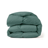 The down feather comforter is brushed in medium tones of forest green. Add a natural element to your bedroom style with this green color medium weight comforter.