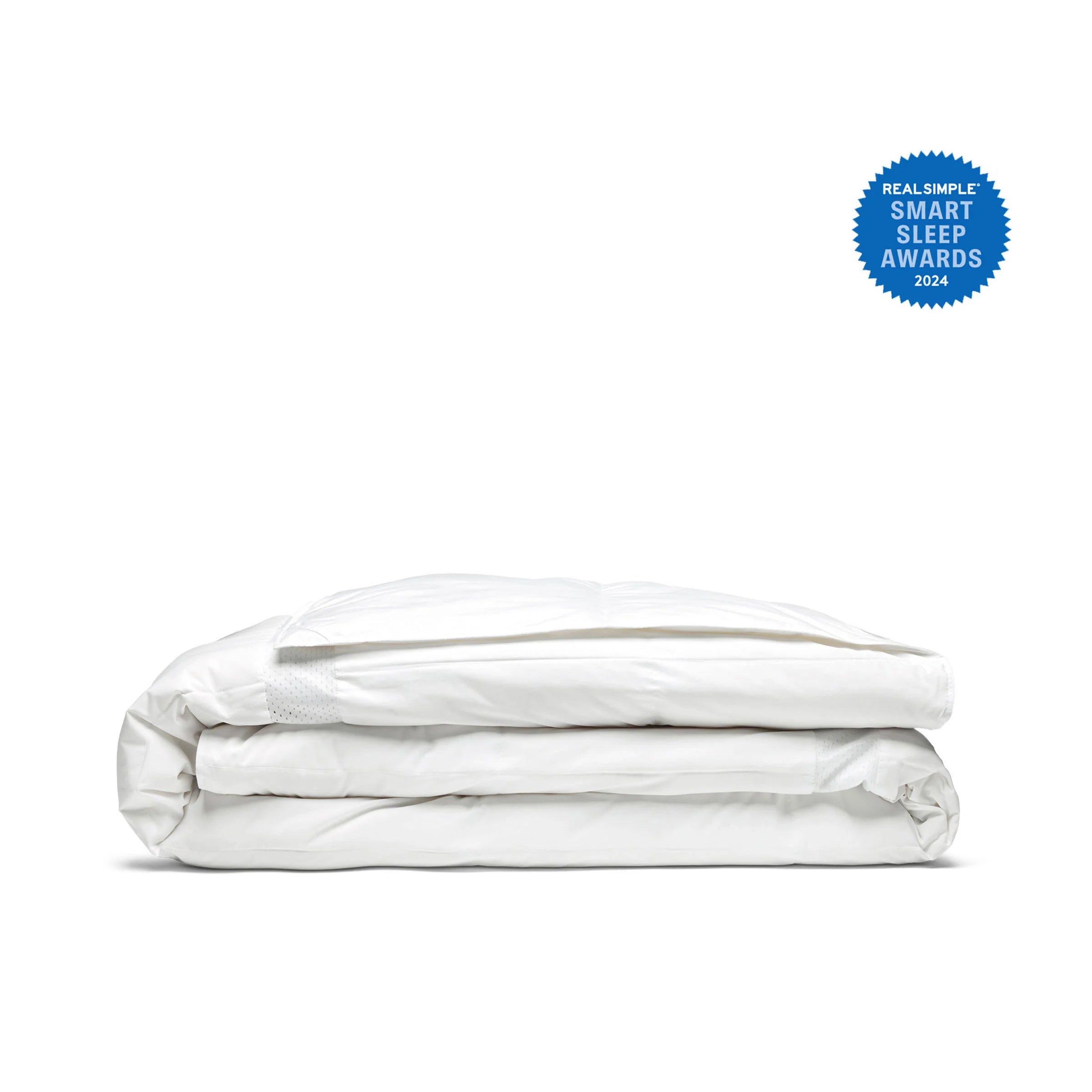 An Ultra Lightweight Cooling Down Comforter, folded in white, with a blue Smart Sleep Awards 2024 badge displayed in the top right corner.