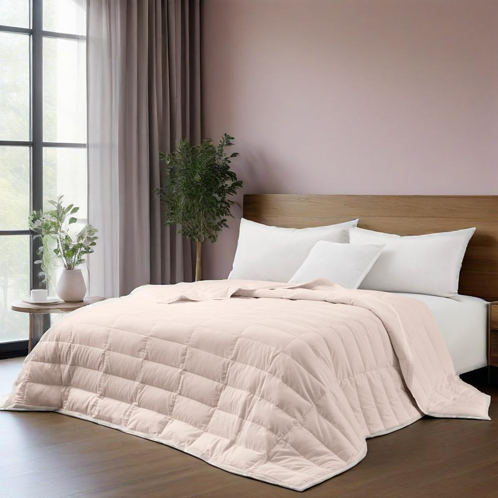 The down blanket is brushed in soft tones of pink. Add a touch of subtle beauty to your room with this cooling tencel lyocell blanket.